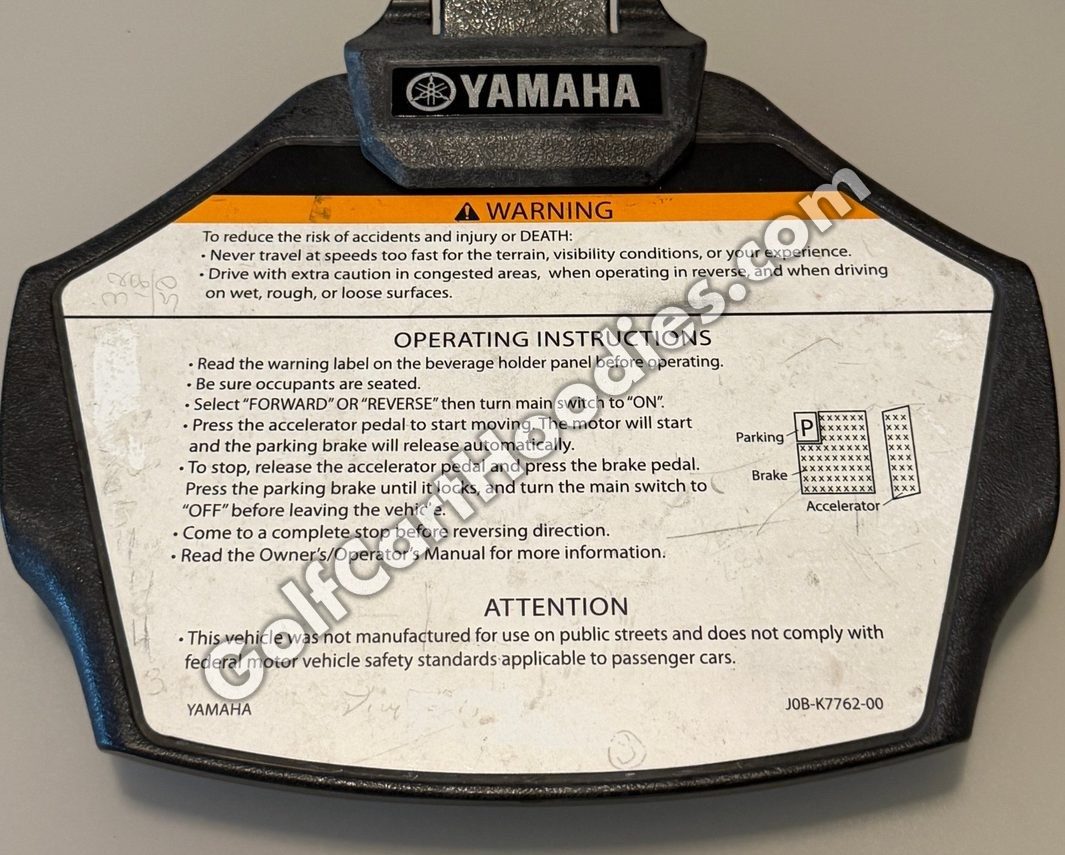 Plain Yamaha factory score card holder with warning labels