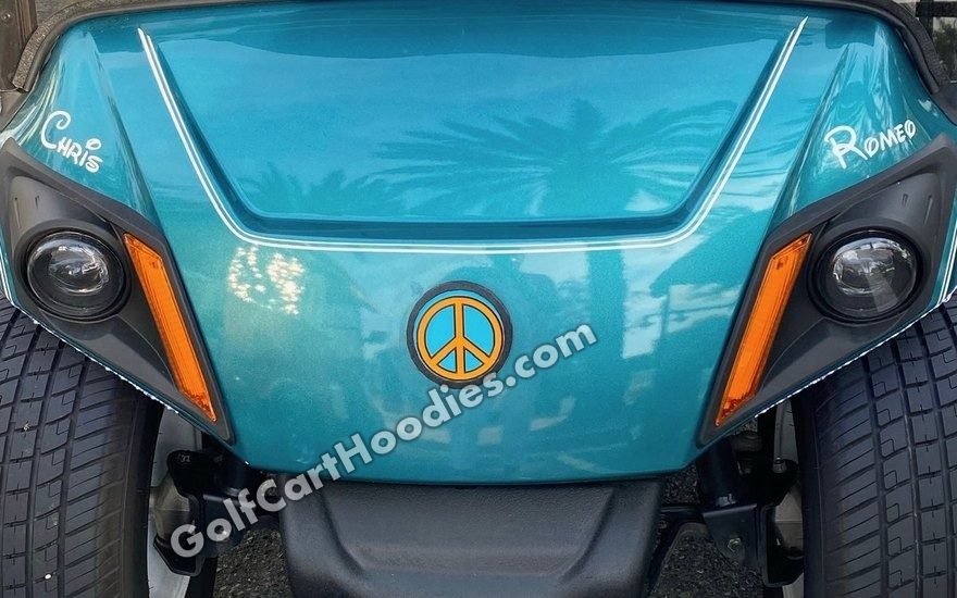 After: peace sign Hoodie fitted over the light-up logo on a teal Yamaha
